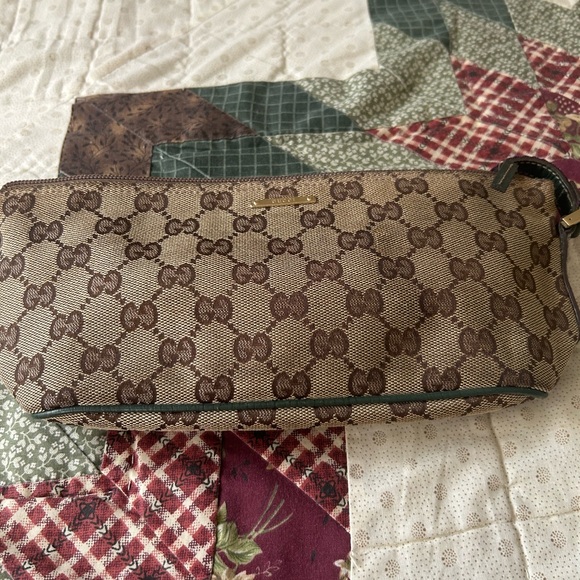 Gucci Handbags - Gucci Brown Monogram Clutch